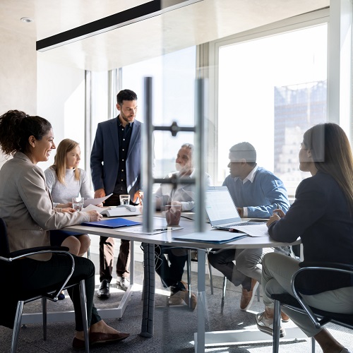 Workforce Development Image - Business meeting of smiling people